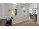 Open office space with ladder shelves and desk at 20269 E Hummingbird Dr, Queen Creek, AZ 85142