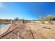 Expansive backyard featuring a pool and desert landscaping, perfect for outdoor entertaining at 21 E Irvine Rd, Phoenix, AZ 85086