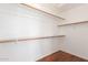 Walk-in closet with multiple shelves and ample storage space at 21 E Irvine Rd, Phoenix, AZ 85086