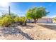 Charming single-story home with desert landscaping and a three-car garage at 21 E Irvine Rd, Phoenix, AZ 85086