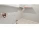 Laundry room featuring tile floors, washer hookups, and shelves for storage at 21 E Irvine Rd, Phoenix, AZ 85086