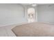 Spacious living room with neutral paint, carpet, tile flooring, and a ceiling fan at 21 E Irvine Rd, Phoenix, AZ 85086