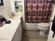 Functional bathroom featuring a toilet, shower, and vanity at 300 S Val Vista Dr # 77, Mesa, AZ 85204