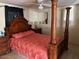 Bedroom with detailed wood accents and a plush, inviting bed at 300 S Val Vista Dr # 77, Mesa, AZ 85204