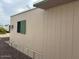 Exterior showing the side of the home with neutral siding at 300 S Val Vista Dr # 77, Mesa, AZ 85204