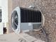 A gray HVAC unit is shown, providing climate control for the home at 300 S Val Vista Dr # 77, Mesa, AZ 85204