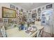 Cozy dining room with unique decor, displaying art and memorabilia on the walls at 3303 E Clarendon Ave, Phoenix, AZ 85018