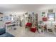Bright living room with tile floors, decorated walls, and ample natural light at 3303 E Clarendon Ave, Phoenix, AZ 85018