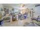 Spacious office with multiple work areas, natural light, and ample storage solutions at 3303 E Clarendon Ave, Phoenix, AZ 85018