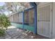 Secluded screened patio with shade offers an inviting space for outdoor enjoyment at 3303 E Clarendon Ave, Phoenix, AZ 85018