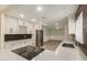 Well-lit kitchen showcasing modern appliances and ample counter space, perfect for culinary enthusiasts at 3450 W Kaler Dr, Phoenix, AZ 85051