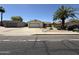 Charming single-story home with desert landscaping, and a detached garage at 3827 E Sweetwater Ave, Phoenix, AZ 85032
