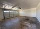 View of empty garage with overhead lighting at 3827 E Sweetwater Ave, Phoenix, AZ 85032