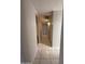 Hallway featuring tile flooring and neutral colored walls at 3827 E Sweetwater Ave, Phoenix, AZ 85032