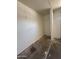 Compact storage area with white walls and concrete floors, ideal for organizing belongings at 3827 E Sweetwater Ave, Phoenix, AZ 85032