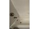 Close-up of tub with tiled surround at 3827 E Sweetwater Ave, Phoenix, AZ 85032