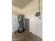 Close-up view of the water heater and other utility components at 3827 E Sweetwater Ave, Phoenix, AZ 85032