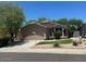 Charming single-story home with a well-maintained lawn and attached two-car garage at 4632 E Melinda Ln, Phoenix, AZ 85050