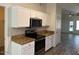 Bright kitchen featuring white cabinets, stainless steel appliances, and granite countertops at 4632 E Melinda Ln, Phoenix, AZ 85050