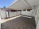 This back patio has a chain link fence and a covered awning at 4849 W Northern Ave, Glendale, AZ 85301