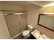 Updated bathroom with a glass-enclosed shower and updated fixtures at 4849 W Northern Ave, Glendale, AZ 85301
