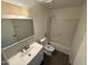 This is a bathroom with a tiled shower and a white vanity at 4849 W Northern Ave, Glendale, AZ 85301
