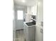 Convenient laundry room with modern appliances and ample storage at 501 E Ray Rd # 230, Chandler, AZ 85225
