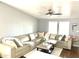 Bright living room showcasing a comfortable sectional sofa, neutral tones, and abundant natural light at 501 E Ray Rd # 230, Chandler, AZ 85225