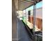 Covered patio area with artificial grass and planters at 501 E Ray Rd # 230, Chandler, AZ 85225