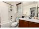 This bathroom has a shower-tub combo, a single sink with a vanity, and a window with blinds at 5235 S Dante --, Mesa, AZ 85212