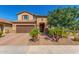 Charming two-story home with a well-manicured front yard and attached two car garage at 5235 S Dante --, Mesa, AZ 85212