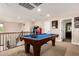 Upstairs game room with pool table and arcade games, perfect for entertaining guests at 5235 S Dante --, Mesa, AZ 85212