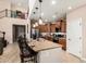 Open kitchen with granite countertops, stainless steel appliances, and seamless flow to the living areas at 5235 S Dante --, Mesa, AZ 85212