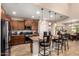Gourmet kitchen with granite countertops, stainless steel appliances, and a breakfast bar at 5235 S Dante --, Mesa, AZ 85212