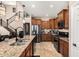 Well-appointed kitchen with an expansive granite island, stainless steel appliances, and pendant lighting at 5235 S Dante --, Mesa, AZ 85212
