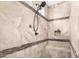 Close-up of the tiled shower with a rain shower head and bench at 5235 S Dante --, Mesa, AZ 85212