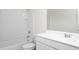 Bright bathroom featuring tiled shower and vanity with sink at 5992 E Artemis Dr, Florence, AZ 85132