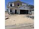 New home under construction with exposed framework and building materials at 5992 E Artemis Dr, Florence, AZ 85132