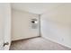 Simple bedroom with neutral carpet and a window at 641 W Freedom St, Florence, AZ 85132