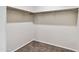 Empty walk-in closet with carpeted floor and hanging rods at 641 W Freedom St, Florence, AZ 85132