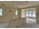 Spacious living room with many large windows at 6446 E Omega Cir, Mesa, AZ 85215