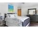 Cozy bedroom with classic furnishings and decor at 7030 E Orange Blossom Ln, Paradise Valley, AZ 85253