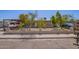 Charming single-story home featuring a fence, mature trees, and covered parking, offering a blend of comfort and convenience at 705 S Pima --, Mesa, AZ 85210