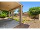 Large backyard with a covered patio perfect for outdoor entertaining at 7911 E Posada Ave, Mesa, AZ 85212