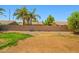 A large backyard with low maintenance landscaping, perfect for outdoor activities at 7911 E Posada Ave, Mesa, AZ 85212
