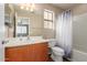 Bathroom featuring a shower and a window at 8468 W Lewis Ave, Phoenix, AZ 85037