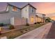Charming home with traditional windows, covered entryway, and lush landscaping at 8468 W Lewis Ave, Phoenix, AZ 85037