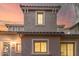 Charming home with traditional windows, covered entryway, and stucco exterior at 8468 W Lewis Ave, Phoenix, AZ 85037