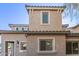 Charming two-story home with a stucco exterior, decorative window trim, and a welcoming front entrance for lasting curb appeal at 8468 W Lewis Ave, Phoenix, AZ 85037
