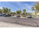 Community parking lot with ample parking spaces available for residents and visitors at 8468 W Lewis Ave, Phoenix, AZ 85037